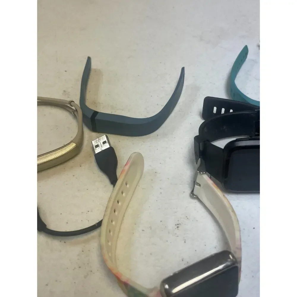 Lot of 7 Fitbit Mixed Brands Activity Tracker Smart Watches Untested For Parts